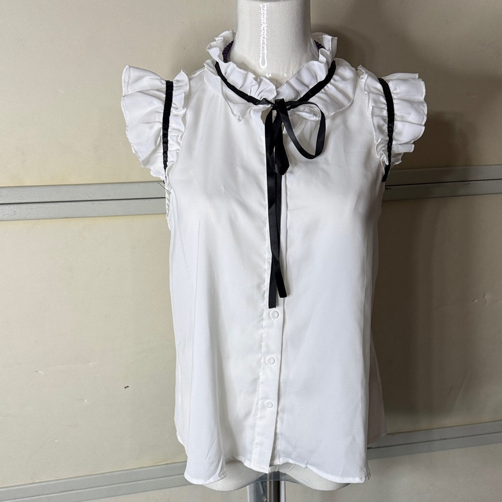 Elegant White Ruffle Blouse with Black Accents
